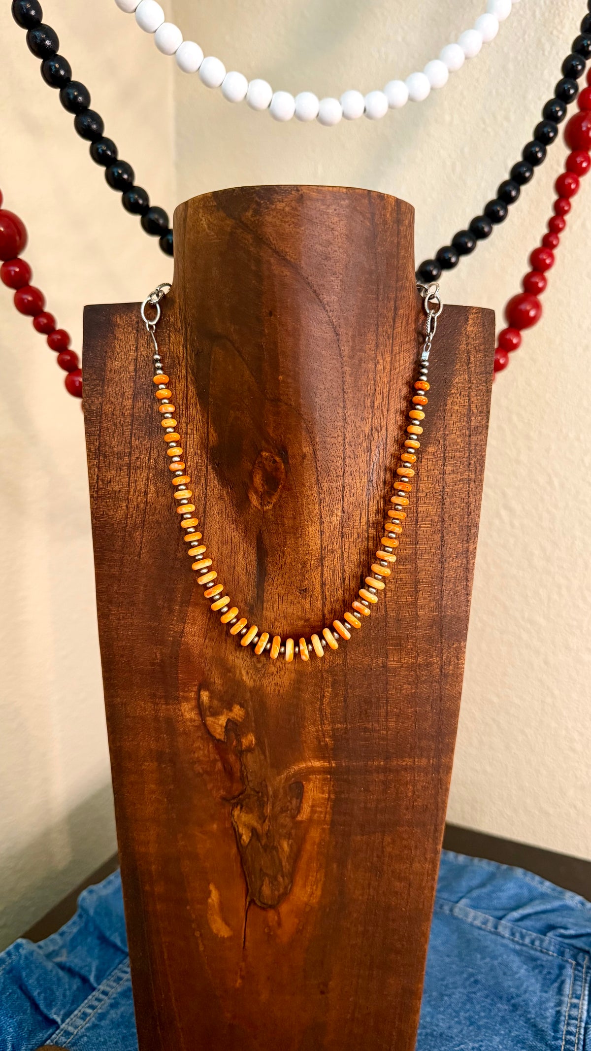 Mini graduated Orange spiny statement half bar-17in