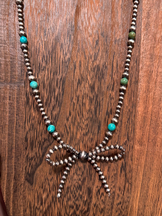 The bow necklace